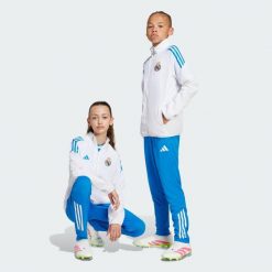Spodnie treningowe Real Madrid Tiro 25 Competition. Niebieskie spodnie sportowe damskie Adidas, bez wzorów, do piłki nożnej. Za 259.00 zł.