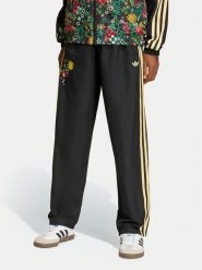 Adidas Spodnie dresowe Liberty London KD5946 Czarny Loose Fit. Czarne spodnie dresowe dziewczęce Adidas, bez wzorów, z dresówki. Za 198.99 zł.
