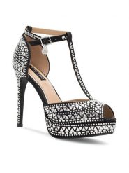 Nine West Sandały NISA SY015-1NW Czarny. Czarne sandały damskie Nine West, bez wzorów, z materiału, bez obcasa, na szpilce, bez zapięcia. Za 179.99 zł.
