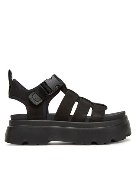 Ugg Sandały W Cora 1152698 Czarny. Czarne sandały damskie Ugg, bez wzorów, z nubiku, bez obcasa, na płaskiej podeszwie, bez zapięcia. Za 599.99 zł.