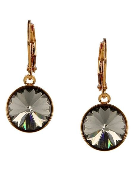 Otazu Pozłacane kolczyki z kryształami Swarovski rozmiar: onesize. Żółte kolczyki damskie Otazu, z kryształem, pozłacane. Za 78.99 zł.