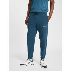 Spodnie dresowe z polaru Hummel Tech Regular. Niebieskie spodnie dresowe damskie Hummel, bez wzorów, z dresówki. Za 304.00 zł.