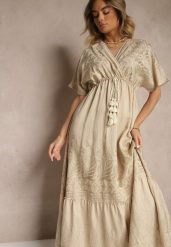 Beżowa Wiskozowa Sukienka Kopertowym Dekoltem i Frędzlami Redevie. Brązowe sukienki damskie Renee, bez wzorów, z wiskozy, eleganckie, bez ramiączek. W wyprzedaży za 91.99 zł.