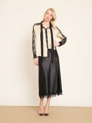 BGN Bluzka w kolorze kremowo-czarnym rozmiar: 38. Brązowe bluzki damskie BGN, bez wzorów, z koronki, bez kołnierzyka, bez ramiączek. Za 143.99 zł.