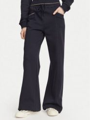 Guess Spodnie dresowe W6YB31 K5319 Granatowy Wide Leg. Niebieskie spodnie dresowe damskie Guess, l, z aplikacjami, z bawełny. Za 434.99 zł.