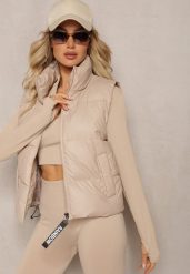 Beżowa Kamizelka z Wysokim Kołnierzem i Suwakiem z Ozdobą Aklaria. Brązowe kamizelki damskie Renee, xl, z aplikacjami, bez kaptura. Za 49.99 zł.