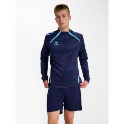 Kurtka wodoodporna Hummel Lead 2.0. Niebieskie kurtki sportowe damskie Hummel, bez wzorów, bez kaptura. Za 279.50 zł.