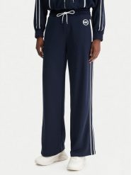 MICHAEL Michael Kors Spodnie dresowe MR630Y0K8N Granatowy Regular Fit. Niebieskie spodnie dresowe damskie MICHAEL Michael Kors, l, bez wzorów, z dresówki. Za 769.99 zł.