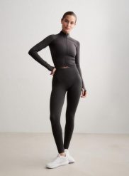 Damskie legginsy dłuższe, wysoki stan, invisible scrunch Shape Seamless szare. Szare legginsy damskie Aim'n, s, bez wzorów, z dzianiny, z podwyższonym stanem, na fitness i siłownię. Za 300.00 zł.