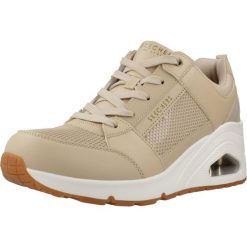 Buty SKECHERS UNO WEDGE - EVERYTHI Jasnobrązowy. Brązowe obuwie sportowe casual damskie Skechers, z syntetyku, bez zapięcia. Za 291.99 zł.