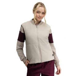Damska ocieplana kamizelka golfowa Siroko Wedge-W Sand. Brązowe kamizelki damskie SIROKO, bez wzorów, bez kaptura. Za 254.00 zł.