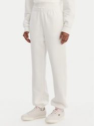 Lacoste Spodnie dresowe XF5244 Écru Regular Fit. Spodnie dresowe damskie Lacoste, bez wzorów, z bawełny. Za 609.99 zł.