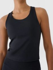 4F Top sportowy w kolorze czarnym rozmiar: M. Czarne koszulki sportowe damskie 4F, m, bez wzorów, z materiału, bez ramiączek, outdoorowe. Za 88.23 zł.