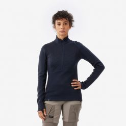 Koszulka damska trekkingowa z długim rękawem Merino Resist. Czarne bluzki damskie FORCLAZ, m, bez wzorów, z materiału, bez kołnierzyka, bez ramiączek. Za 299.99 zł.