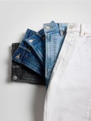 Jeansy slim fit mid rise - granatowy. Niebieskie jeansy damskie Reserved. W wyprzedaży za 79.99 zł.