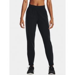 Spodnie sportowe damskie Under Armour UA OutRun the Storm. Czarne spodnie dresowe damskie Under Armour, m, bez wzorów, z dresówki. Za 249.99 zł.