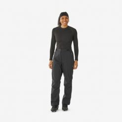 Spodnie do narciarstwa biegowego damskie Inovik 100 wierzchnie. Czarne spodnie sportowe damskie INOVIK, na zimę, l, bez wzorów, z materiału, do biegania. Za 189.99 zł.