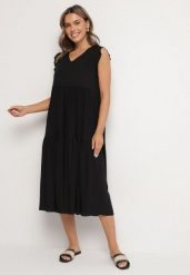 Czarna Bawełniana Sukienka Ozdobiona Falbankami Aveliova. Czarne sukienki damskie Born2be, bez wzorów, z bawełny, eleganckie, bez ramiączek. Za 69.99 zł.