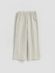 Piżamowe spodnie - jasnozielony. Zielone piżamy damskie Reserved, bez wzorów, z bawełny, bez ramiączek. Za 59.99 zł.