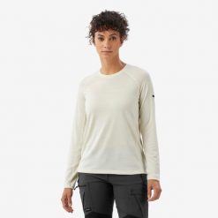 Koszulka trekkingowa damska z długim rękawem Merino Resist undyed. Białe bluzki damskie FORCLAZ, l, bez wzorów, z materiału, bez kołnierzyka, bez ramiączek. Za 199.99 zł.
