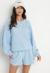 Niebieski Dzianinowy Komplet Bluza i Szorty Novanisa. Niebieskie bluzy damskie Born2be, na lato, bez wzorów, z dzianiny, bez kaptura. Za 129.99 zł.
