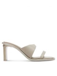 Calvin Klein Klapki Heel Slide 70 Lth HW0HW02072 Beżowy. Brązowe klapki damskie Calvin Klein, bez wzorów, ze skóry, bez obcasa, bez zapięcia. Za 529.99 zł.