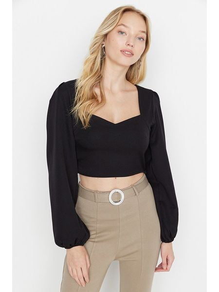 Trendyol Bluzka w kolorze czarnym rozmiar: 34. Czarne bluzki damskie Trendyol, bez wzorów, bez kołnierzyka, bez ramiączek. Za 21.97 zł.
