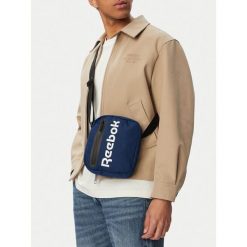 Saszetka Reebok. Niebieskie nerki i saszetki damskie Reebok, bez wzorów. Za 59.99 zł.