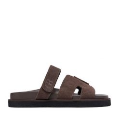 Klapki GINO ROSSI. Brązowe klapki damskie Gino Rossi, bez wzorów, bez obcasa, bez zapięcia. Za 179.99 zł.