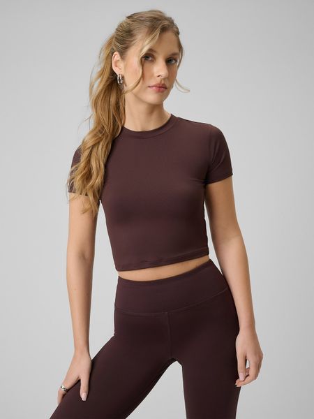 4F T-shirt slim gładki damski - brązowy XL. Brązowe t-shirty damskie 4F, xl, bez wzorów, z materiału, bez kołnierzyka. W wyprzedaży za 39.99 zł.