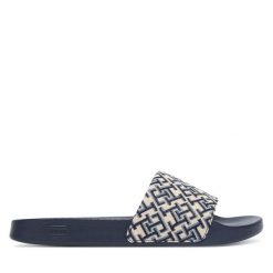 Klapki Tommy Hilfiger. Niebieskie klapki damskie Tommy Hilfiger, bez wzorów, bez obcasa, bez zapięcia. Za 169.99 zł.