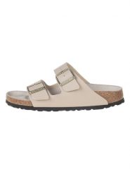 Birkenstock Klapki "Arizona" w kolorze kremowym rozmiar: 38. Brązowe klapki damskie Birkenstock, bez wzorów, z otwartym noskiem, bez obcasa, bez zapięcia. Za 324.95 zł.