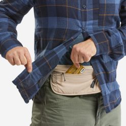 Torba trekkingowa biodrówka TRAVEL RFID. Brązowe torby podróżne FORCLAZ, bez wzorów, z materiału. Za 39.99 zł.