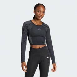 Koszulka Seamless Knitted Long Sleeve. Czarne koszulki damskie Adidas, xs, bez wzorów, z materiału, bez kołnierzyka, bez ramiączek. Za 249.00 zł.