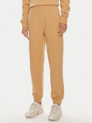 Calvin Klein Spodnie dresowe Nano Logo K20K207214 Beżowy Relaxed Fit. Brązowe spodnie dresowe damskie Calvin Klein, xl, bez wzorów, z bawełny. Za 249.99 zł.