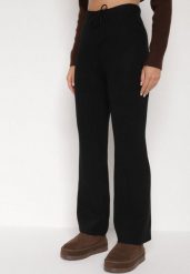 Czarne Prążkowane Spodnie z Wełną o Szerokim Kroju z Wysokim Stanem Reinnia. Czarne spodnie materiałowe damskie Born2be, bez wzorów, z jeansu. Za 79.99 zł.