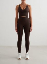 Damskie legginsy bezszwowe, wysoki stan, squat proof petite Shape czekoladowy. Brązowe legginsy damskie Aim'n, xs, bez wzorów, z elastanu. Za 296.00 zł.