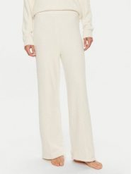 Calvin Klein Spodnie piżamowe 000QS7338E Écru Relaxed Fit. Piżamy damskie Calvin Klein, bez wzorów, z syntetyku, bez ramiączek. Za 149.99 zł.