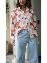 Milan Kiss Bluzka w kolorze biało-pomarańczowym rozmiar: S. Białe bluzki damskie Milan Kiss, s, bez wzorów, z wiskozy, bez kołnierzyka, bez ramiączek. Za 156.24 zł.