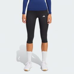 Legginsy capri TECHFIT. Niebieskie legginsy damskie Adidas, bez wzorów, z materiału. Za 179.00 zł.