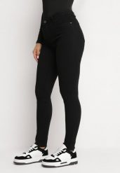 Czarne Jeansy Skinny Podkreślające Nogi Trilles. Czarne jeansy damskie Born2be, bez wzorów, z bawełny. Za 79.99 zł.