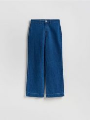 Jeansy z szeroką nogawką - niebieski. Niebieskie jeansy damskie Reserved. Za 129.99 zł.