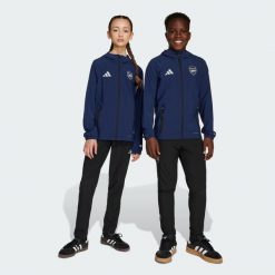 Spodnie Arsenal Tiro Travel 25 Competition Vis Tech. Czarne spodnie sportowe damskie Adidas, bez wzorów, do piłki nożnej. Za 279.00 zł.