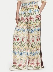 Adidas Spodnie dresowe Farm Rio KZ5537 Kolorowy Loose Fit. Spodnie dresowe damskie Adidas, m, bez wzorów, z dresówki. Za 599.99 zł.