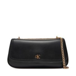 Torebka Calvin Klein. Czarne torebki wieczorowe damskie Calvin Klein, bez wzorów, bez dodatków. Za 369.99 zł.