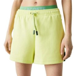 Spodenki damskie Lacoste. Zielone spodenki sportowe damskie Lacoste, na lato, xs, z aplikacjami, z dresówki, z podwyższonym stanem. Za 197.00 zł.