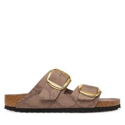 Klapki Birkenstock. Brązowe klapki damskie Birkenstock, bez wzorów, bez obcasa, bez zapięcia. Za 458.99 zł.