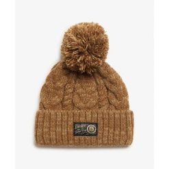 Gruba czapka w warkoczowym splocie damska Superdry. Brązowe czapki damskie Superdry, na zimę, bez wzorów, z dzianiny. W wyprzedaży za 133.85 zł.