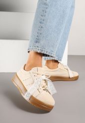 Beżowe Sneakersy na Niskiej Platformie z Aplikacjami i Kokardkami Divienne. Brązowe obuwie sportowe damskie Renee, z jeansu, bez zapięcia. Za 79.99 zł.