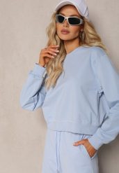 Jasnoniebieska Oversize Bluza z Bawełny o Krótkim Fasonie Sibolla. Niebieskie bluzy damskie Renee, l, bez wzorów, z bawełny, bez kaptura. Za 89.99 zł.